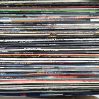 A box of LPs and 12" singles by various artists including Kate Bush, Eurythmics, Prince and others.