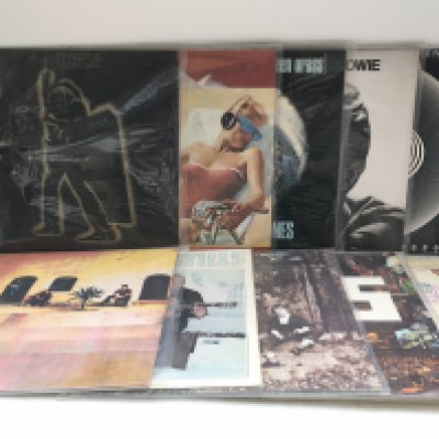 Ten rock LPs by various artists including T Rex, David Bowie, Queen and others.