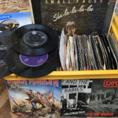 A crate of LPs and 7" singles by various artists from the 1960s onwards including Small Faces, Little Richard, Iron Maiden and many more.