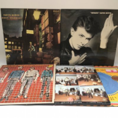 Two early pressings of David Bowie LPs comprising 'Ziggy Stardust' and 'Heroes' plus three LPs by Talking Heads (5).