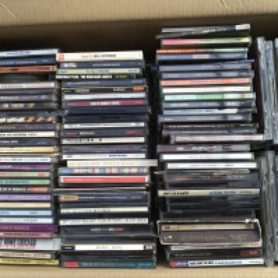 Two boxes of CDs by various artists including Oasis, John Grant, Goldfraap, John Martyn and many more plus a case of 8 track cartridges (3).