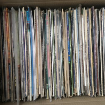 A box of 1970s rock LPs by various artists including Country Joe & The Fish, Bad Company, Sparks and many more.