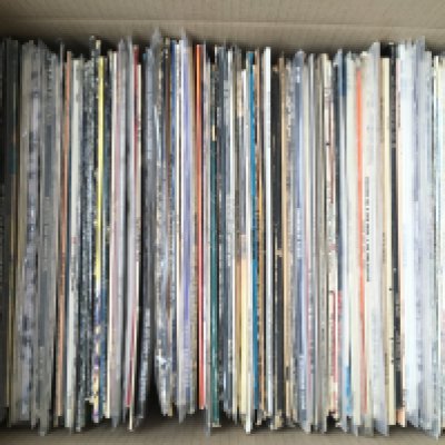 A box of LPs by various artists including Tom Petty, Albert Lee, BB King and many more.