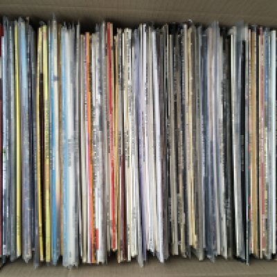 A box of jazz LPs by various artists including Miles Davis, Milt Jackson, Donald Byrd and many more.