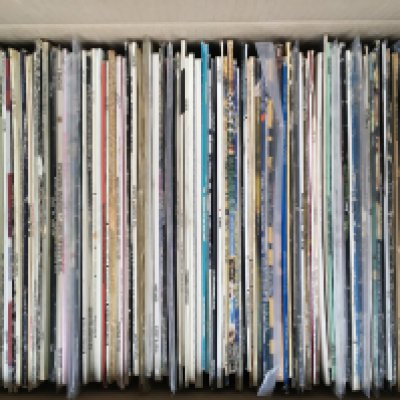 A box of LPs by various artists including Camel, The Band, Juicy Lucy and many more.