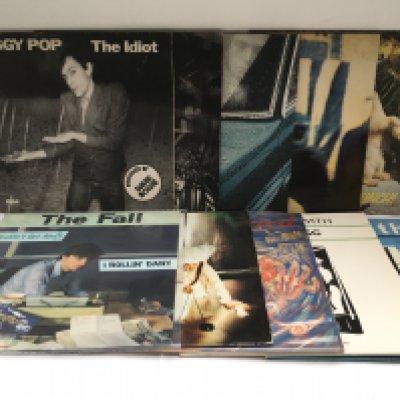 Two bags containing over 30 alt rock and indie LPs and 12" singles by various artists including The Smiths, The Fall, Lens Lovich, Peter Gabriel and others.