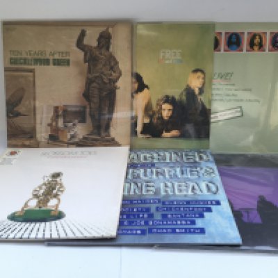 Two bags containing 13 rock LPs by various artists including Ten Years After, Free, Jimi Hendrix, Moby Grape and others. Includes original and 180g pressings. Some sealed and mint examples.
