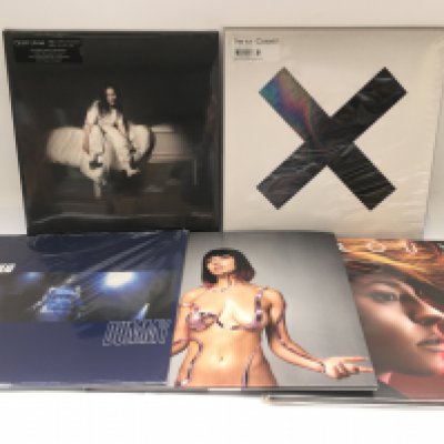 Two bags containing 11 LPs and 12" singles by various artists including The XX, Billie Eilish, Goldfrapp and others. Includes mainly 180g pressings.