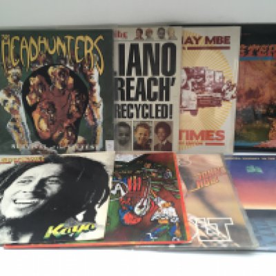 A collection of reggae, ska and world music LPs and 12" singles by various artists including Bob Marley, Gregory Isaacs, John Holt, The Headhunters and others.