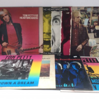 Seven Tom Petty LPs and 12" singles comprising 'Damn The Torpedoes', 'Southern Accents' and others.