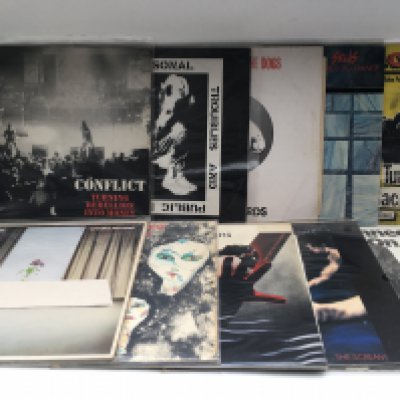A record case of over 50 punk rock LPs and 12" singles by various artists including Sex Pistols, Wire, Magazine, Crass and others.