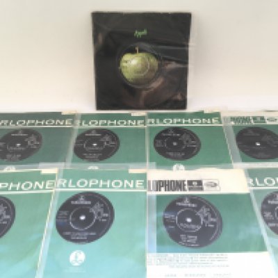 Nine Beatles 7" singles including a solid centre 'Help!' b/w 'I'm Down'.