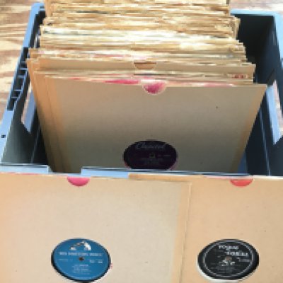 A box of 78s by various artists including Elvis Presley, Gene Vincent, Everly Brothers and others.