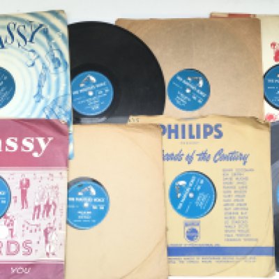 A collection of rock n roll 78s comprising many Elvis Presley titles, Bill Haley, Gene Vincent and others.