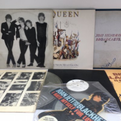 Thirteen LPs and 12" singles comprising promos, picture discs and an acetate.