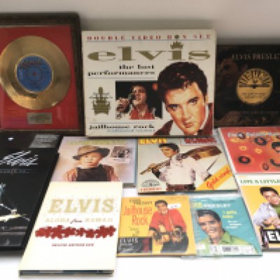 A collection of Elvis Presley vinyl, CD and DVD box sets.