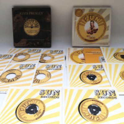 Two Elvis Presley Sun singles vinyl box sets.