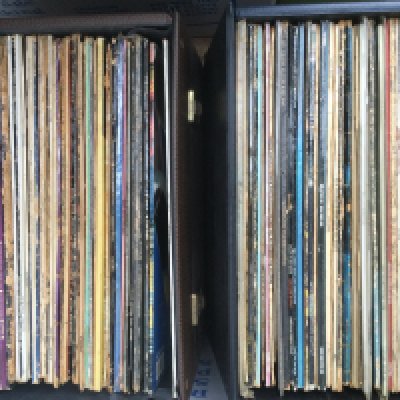 Two record cases of LPs by various artists including INXS, Ten Years After, Roy Harper, James Brown and many more.
