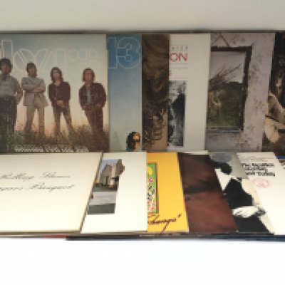 A collection of LPs, 7" singles and music programs by various artists including Led Zeppelin, The Beatles, Rolling Stones and others.