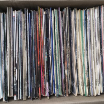 A box of LPs y various artists including Steely Dan, Eric Clapton, Fleetwood MAC and others.