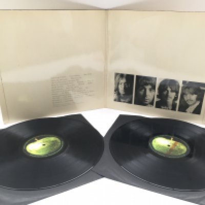 A numbered Beatles 'White Album', numbered 0094615. Complete with black inners and all inserts. Vinyl Ex, sleeve VG+.