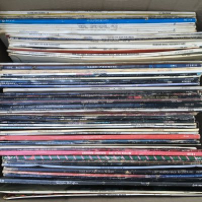 A collection of LPs and 12" singles by various artists including Cream, Pink Floyd, Van Halen and others.