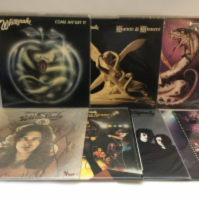 Seven Whitesnake and related LPs.