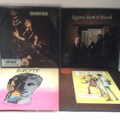 Four LPs by Mott The Hoople and Suzi Quatro comprising an early pressing of 'Mott', a 50th anniversary limited edition orange vinyl 'All The Young Dudes' and others.