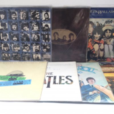 Fourteen Beatles and related compilation LPs comprising 'Rarities', 'Rock & Roll Music', 'Christmas Album' and others.