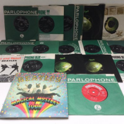 A first UK pressing red label 'Love Me Do' with ZT tax code, excellent condition except for a tiny scratch on the run out groove. Comes with various other Beatles 7" singles and EPs.