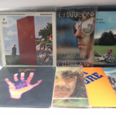 Seven George Harrison LPs comprising 'Wonderwall Music', 'All Things Must Pass', 'Living In The Material World' and others.