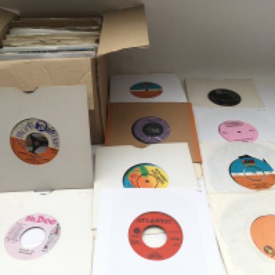A box of reggae, ska and soul 7" singles by various artists including Jimmy Cliff, Bob Marley, The Tams and many more.