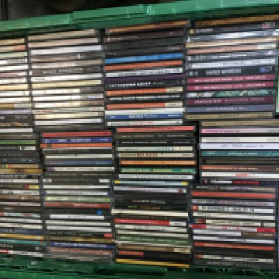 Eleven boxes of CDs by various artists including The Clash, The Charlatans, Elliott Smith, MC5 and many more.