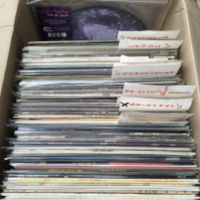 A box of Queen and related LPs and 12" singles including picture discs.