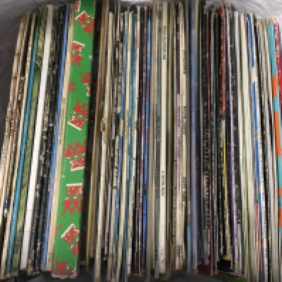 A collection of LPs and 12" singles by various artists including The Beatles, Pink Floyd, Tangerine Dream and others.
