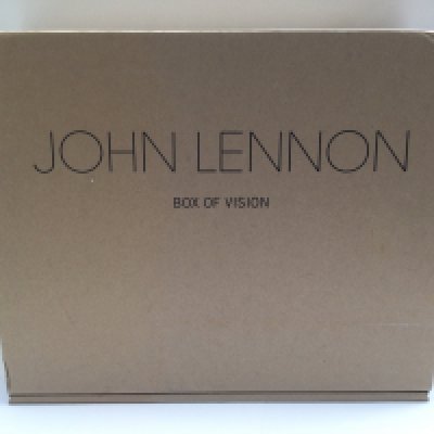 A John Lennon 'Box Of Vision' CD storage, catalogue and book plus contents.