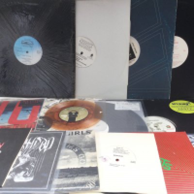 A collection of 12" and 7" singles comprising some limited editions and picture discs. Artists include Bauhaus, The Ruts and others.