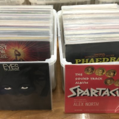 Two boxes of TV and film soundtrack LPs including Midnight Express, A Bridge Too Far, Spartacus and many more.