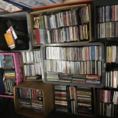 A large collection of CDs and audio cassettes, various artists.