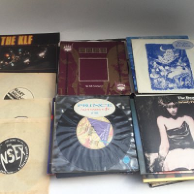A collection of 7" singles from the 1970s onwards by various artists including The Damned, The Insex, KLF, Prince and others..