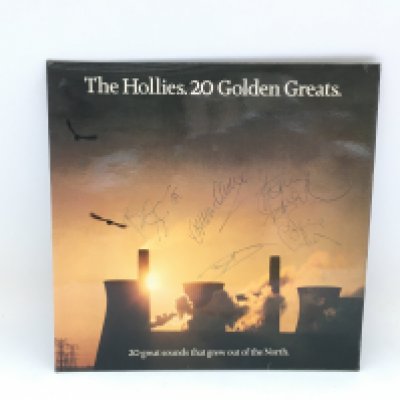 A signed greatest hits LP by The Hollies.