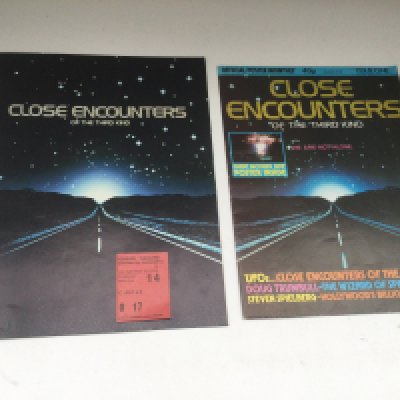 A 'Close Encounters Of The Third Kind' program and ticket from March 14th 1978, the day after the UK premiere, plus three uk quad film posters for 'The Elephant Man', 'The Wild Geese' and 'Tarka The Otter'.