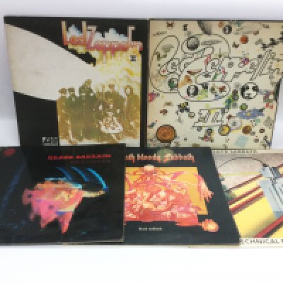 Two Led Zeppelin LPs and three by Black Sabbath, mostly reissues, Vertigo spaceship labels, orange and green Atlantic labels.
