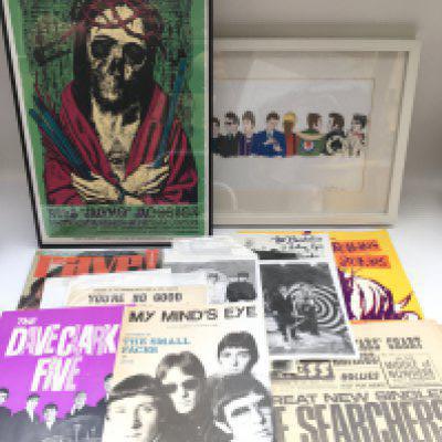 A collection of music memorabilia comprising South Austin Museum of Popular Culture framed poster, Rolling Stones 'Urban Jungle' tour program, black and white publicity photos etc.