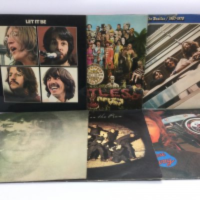 Six Beatles and related LPs comprising 'Sgt Pepper', 'Let It Be' and others.