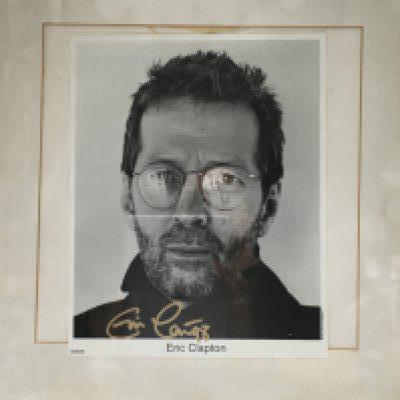 A signed Eric Clapton publicity print, no COA. Please note that buyers must satisfy themselves as to the authenticity of any signed items before bidding as we are not experts in this field and will not be held responsible should they prove to be anything other than genuine.