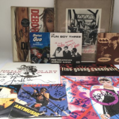 A collection of signed records by various artists including Boy George, Debbie Harry, Terry Hall, Adam Ant and others. No COAs. Please note that buyers must satisfy themselves as to the authenticity of any signed items before bidding as we are not experts in this field and will not be held responsible should they prove to be anything other than genuine.