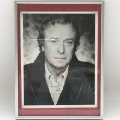A framed and signed photo of Michael Caine. No COA. Please note that buyers must satisfy themselves as to the authenticity of any signed items before bidding as we are not experts in this field and will not be held responsible should they prove to be anything other than genuine.