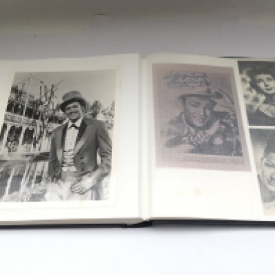 Three binders of film star publicity photos, some signed and various lobby cards.