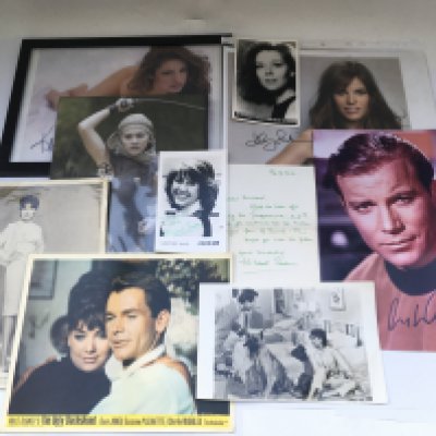 A collection of music and film ephemera comprising press photos by Kevin Cummins, both genuine and printed autographs, lobby cards etc.